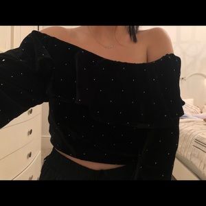Black velvet off the shoulder crop top.